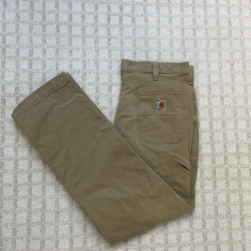 Tan Carharrt Pants.